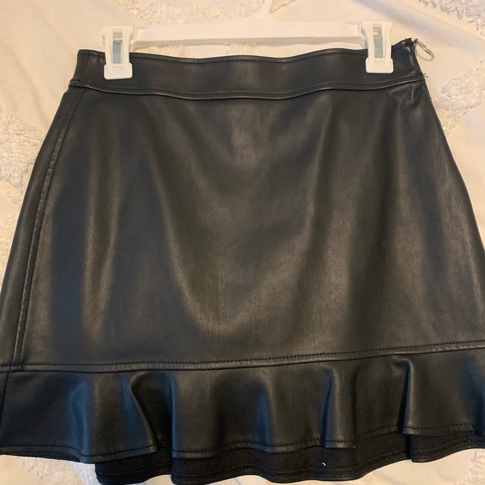 Black express faux leather mini skirt with ruffle hem